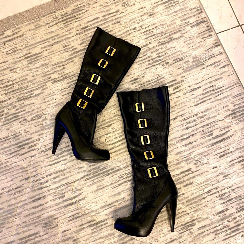 Black tall boots.